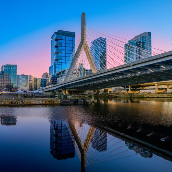 Boston,City,Sunset,Skyline,Over,Zakim,Bridge,And,The,Charles