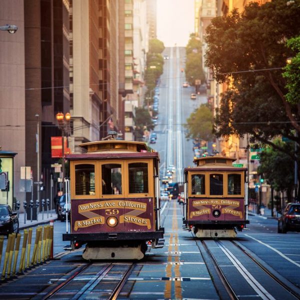 Classic,View,Of,Historic,Traditional,Cable,Cars,Riding,On,Famous